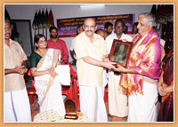 Felicitation to Padmasree Peruvanam Kuttan Marar by Cochin Dewaswom Board. Memento is presented by the Hon. President Sri. MCS Menon. From left to right:M.Sukumaran (Special Dewaswom Commissioner), M.L Vanajakshi (Member, Cochin Dewaswom Board), MCS Menon (President, Cochin Dewaswom Board), K. Kuttappan (Member, Cochin Dewaswom Board), P. Ramani (Secretary, Cochin Dewaswom Board).